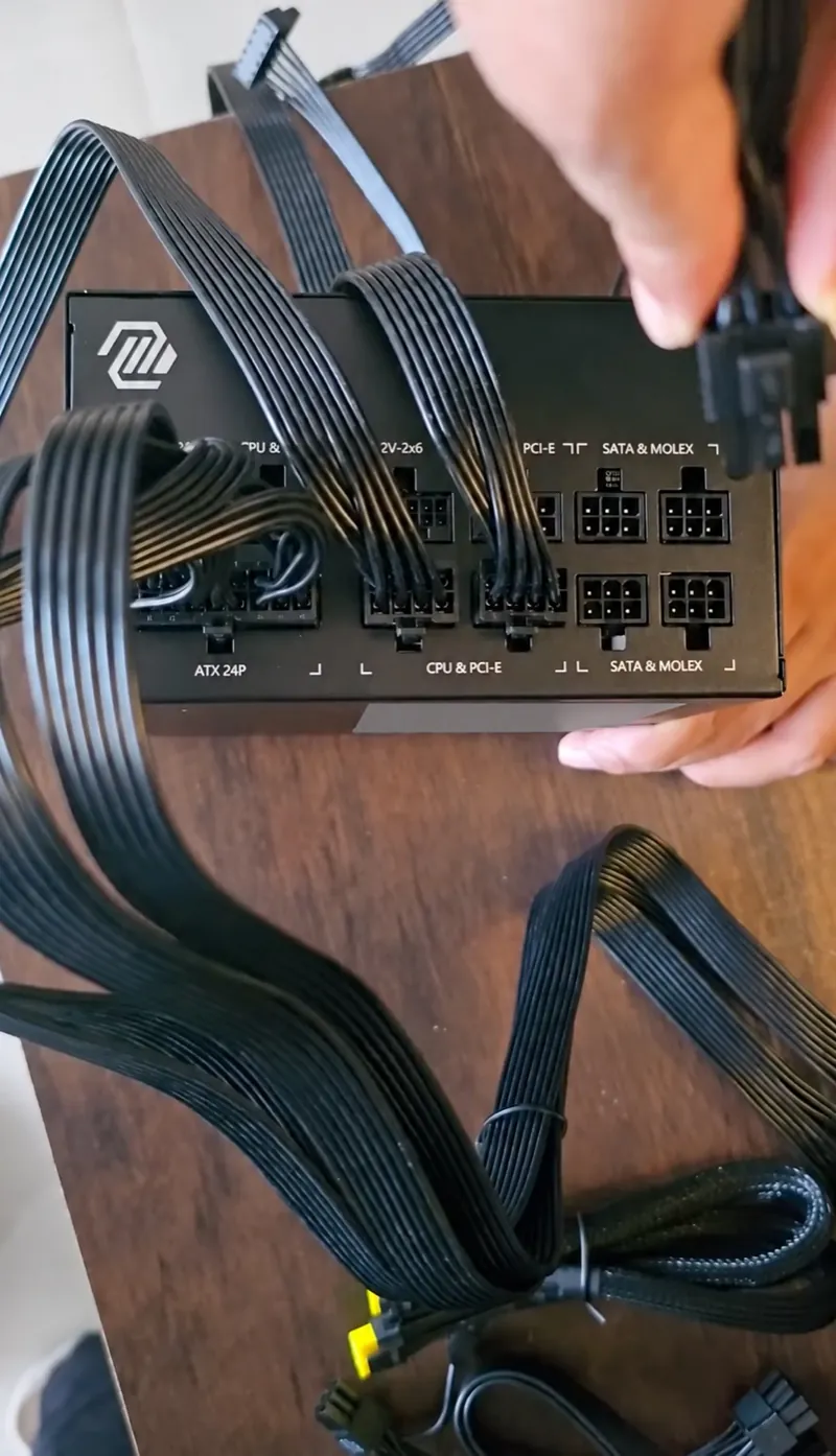 Modular PSU connection panel with labelled ATX, CPU and PCIe, and SATA socket groups