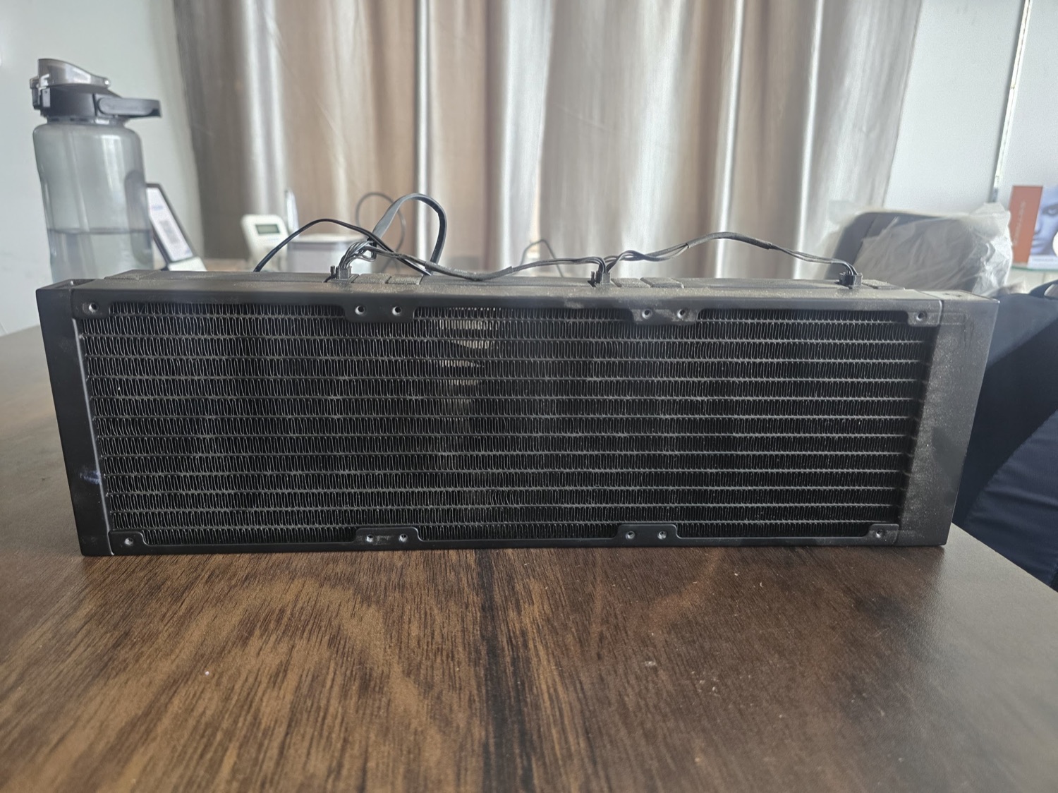 A dusty liquid-cooler radiator photographed at the GetPC shop