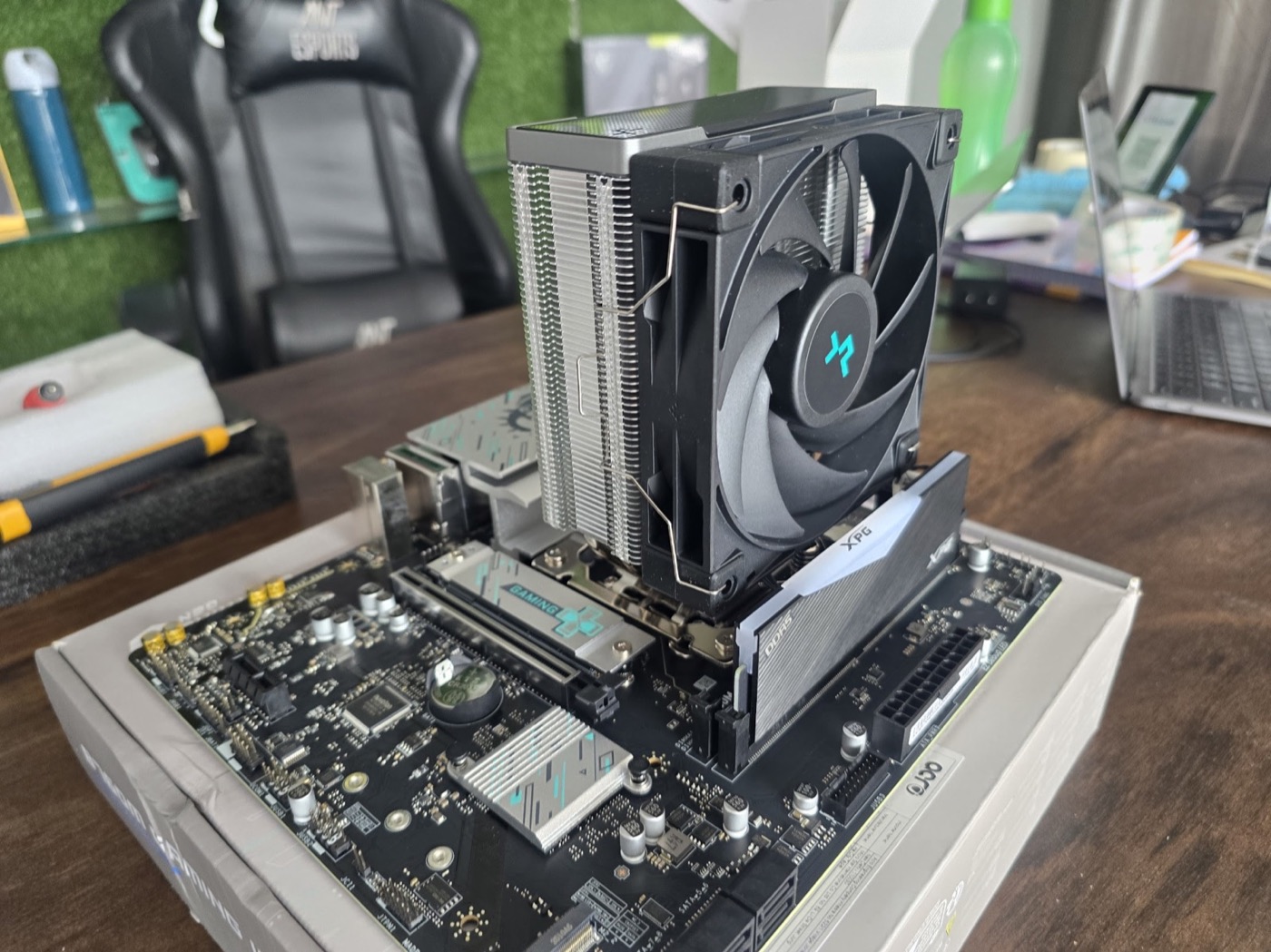 A motherboard, CPU cooler and memory assembled on a GetPC test bench