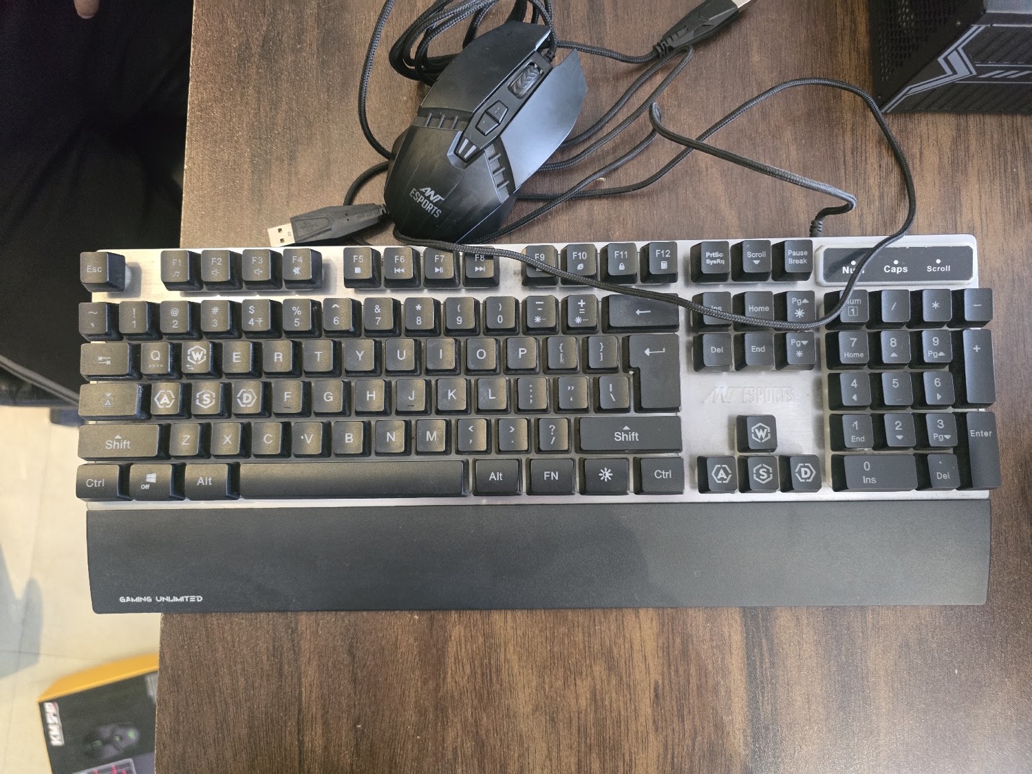A keyboard and mouse on the GetPC shop counter for inspection